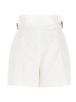 Short bianchi con fibbie dorate