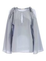 Blusa azzurra con fiocchi