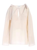 Blusa bianca con fiocchi