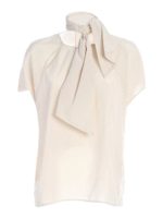 Blusa bianca con scollo a goccia sul retro