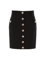 Gonna in lana con iconici bottoni