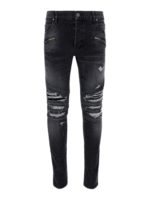 Jeans in denim con dettagli destroyed