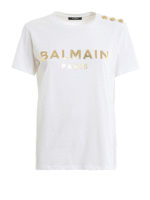 T-shirt bianca con bottoni dorati