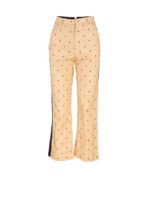 Pantaloni monogramma beige e neri