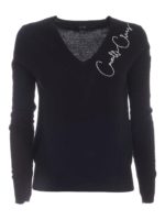 Pullover nero con perline bianche