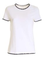 T-shirt bianca con ricami a contrasto