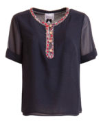 Blusa a manica corta con bottoni