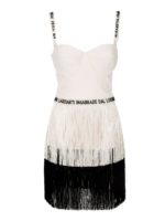 Abito bianco e nero con frange