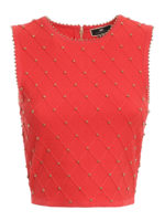 Top in maglia con borchie