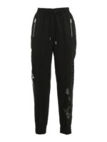 Pantaloni stile joggers con inserti in pizzo