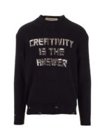 Pullover nero effetto destroyed
