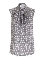 Top in seta rosa stampa geometrica