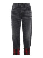 Jeans con risvolti tartan