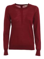 Pull con bottoni sul retro