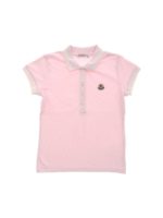 Polo rosa con patch logo