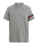 Polo grigia con patch del logo