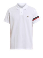 Polo bianca con patch del logo