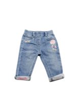 Jeans con ricami blu