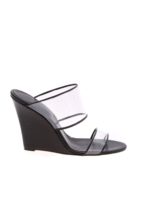 Zeppe nere con dettagli trasparenti