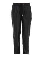 Pantaloni in finta pelle modello tuta