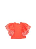 Top rosso con rifiniture traforate