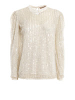 Blusa semitrasparente con paillettes