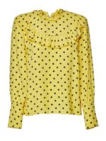 Blusa gialla e nera a pois